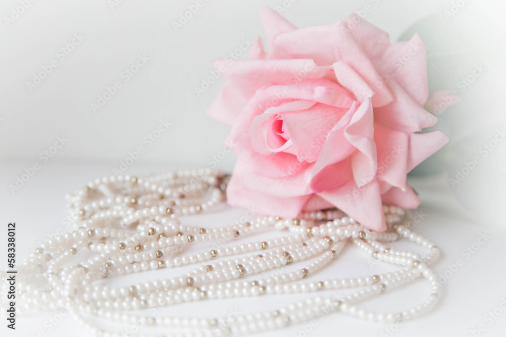 Wedding background with rose and beads Wedding background with rose and beads