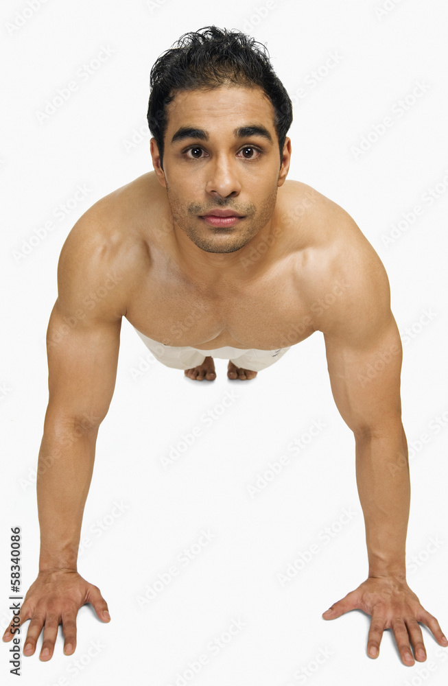 Portrait of a man doing push-ups Portrait of a man doing push-ups