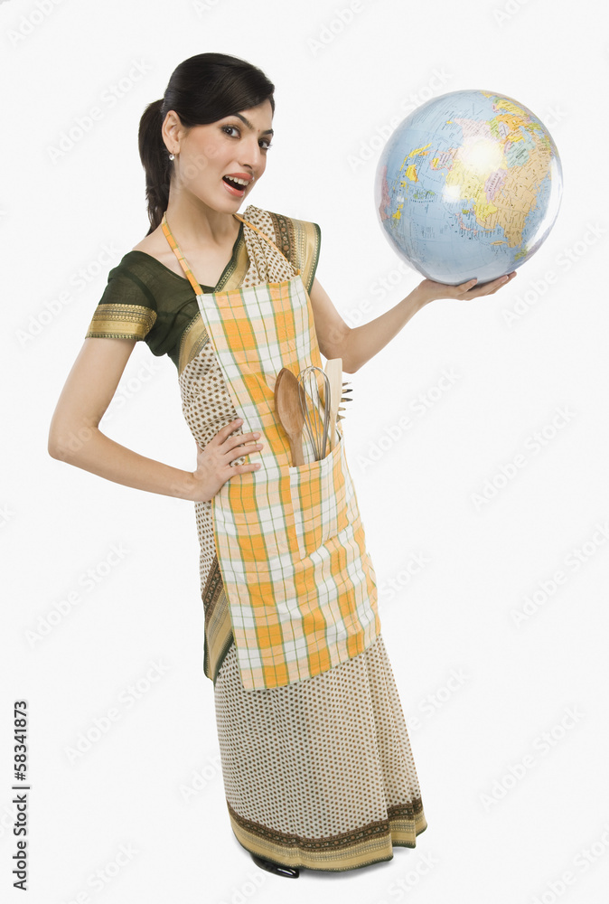 Woman holding a globe Woman holding a globe