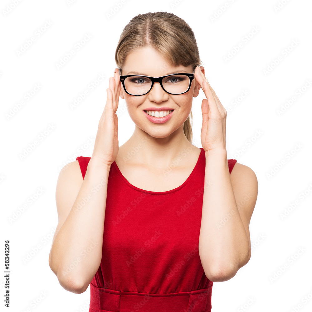 Smiling fashion woman touching her optical glasses, isolated Smiling fashion woman touching her optical glasses, isolated