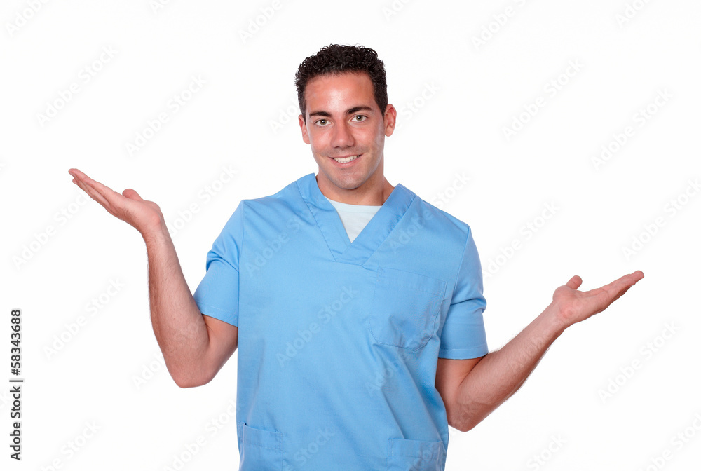 Attractive nurse man holding out his hands Attractive nurse man holding out his hands