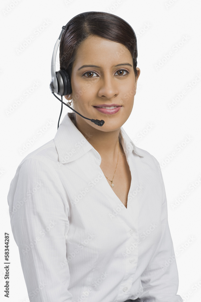 Female customer service representative using a headset Female customer service representative using a headset