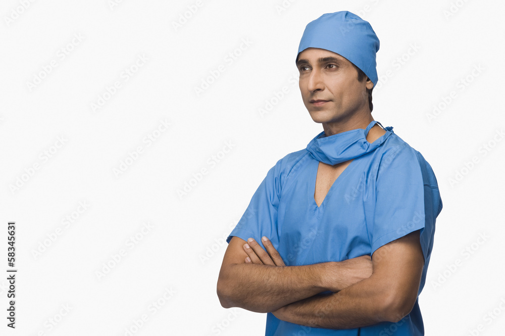 Doctor standing with arms crossed