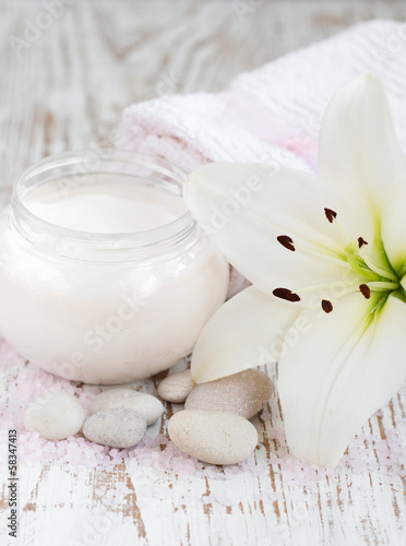 Face cream with lily flowers