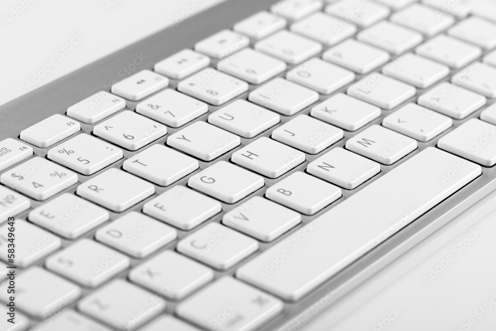Close-up computer keyboard with bokeh effect Close-up computer keyboard with bokeh effect