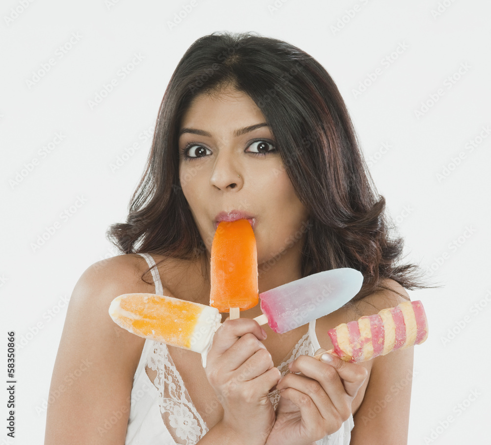 Portrait of a woman eating ice cream Portrait of a woman eating ice cream