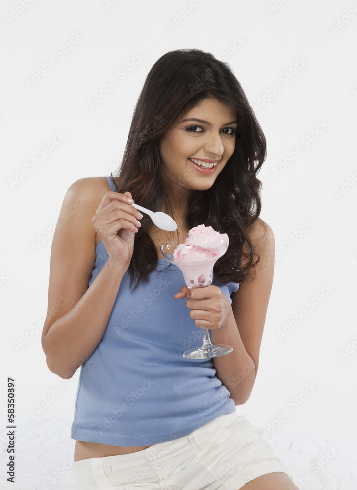 Portrait of a woman eating ice cream Portrait of a woman eating ice cream