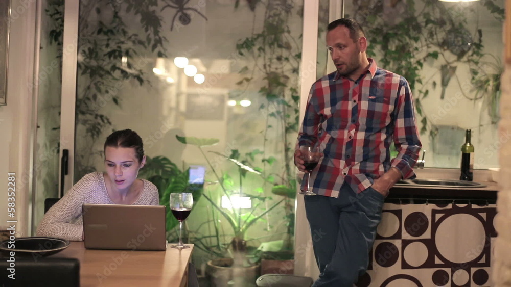 Conflict between angry man and woman working on the laptop Conflict between angry man and woman working on the laptop