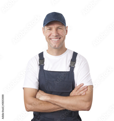 Portrait of smiling worker in blue uniform isolated on white bac