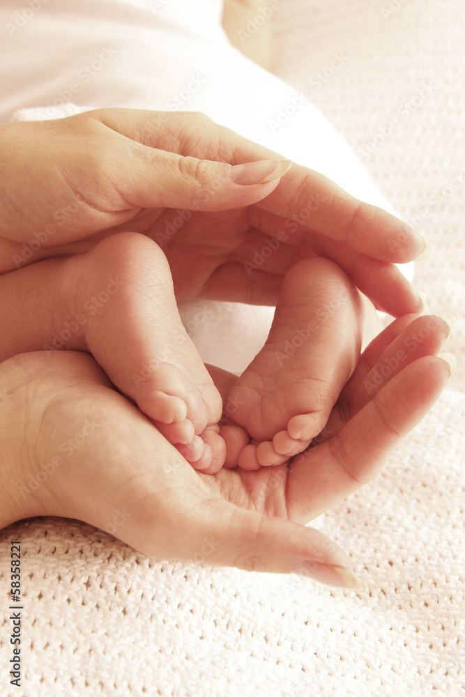 a foot one cute little newborn baby