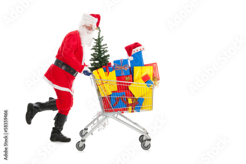 Santa Claus running with shopping cart © Ivonne Wierink