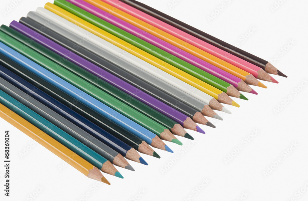 Close-up of colored pencils in a row Close-up of colored pencils in a row