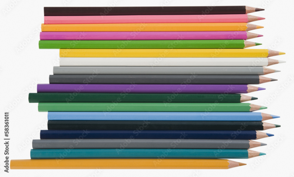 Close-up of colored pencils in a row Close-up of colored pencils in a row
