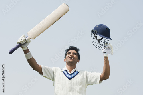 Fotografie Cricket batsman celebrating his success