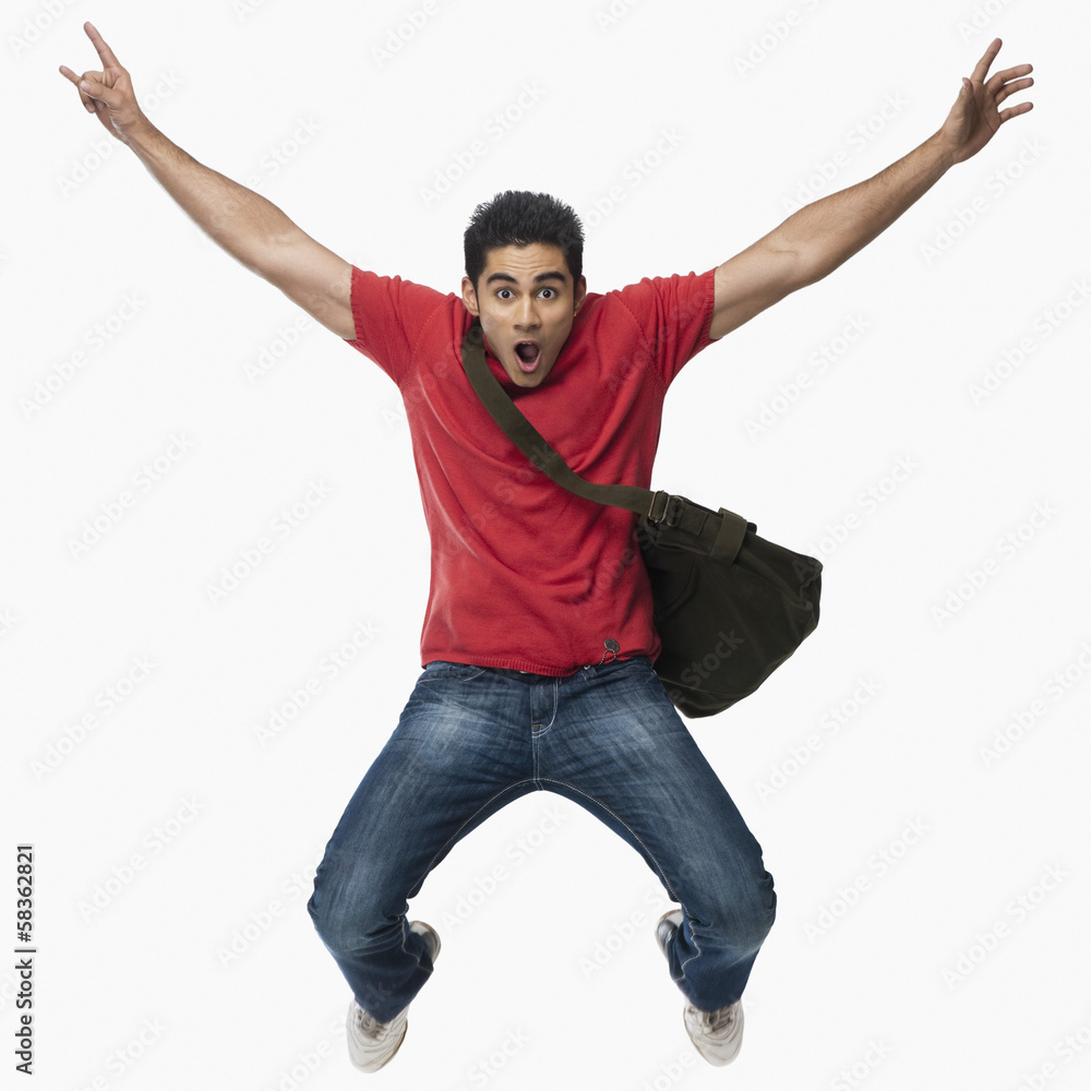 University student jumping in excitement University student jumping in excitement