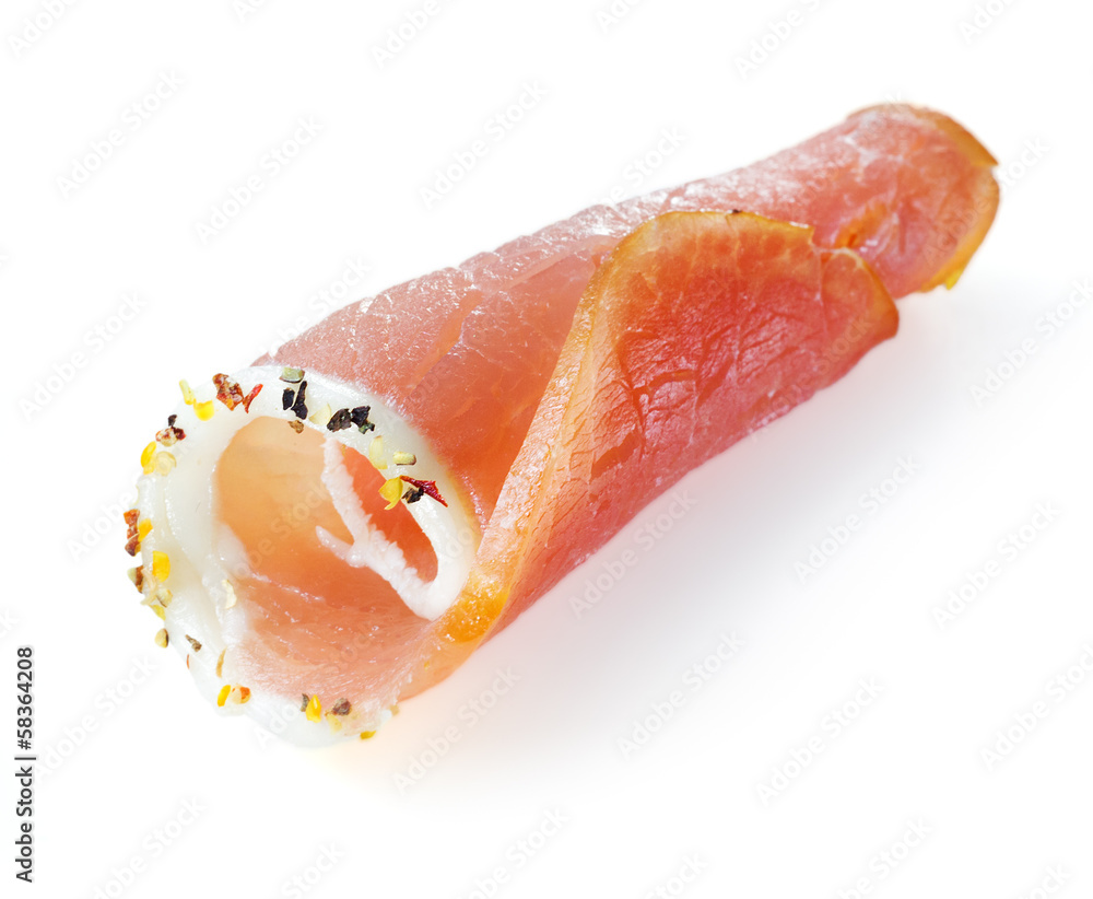Fresh sliced ham with spice on a white background Fresh sliced ham with spice on a white background
