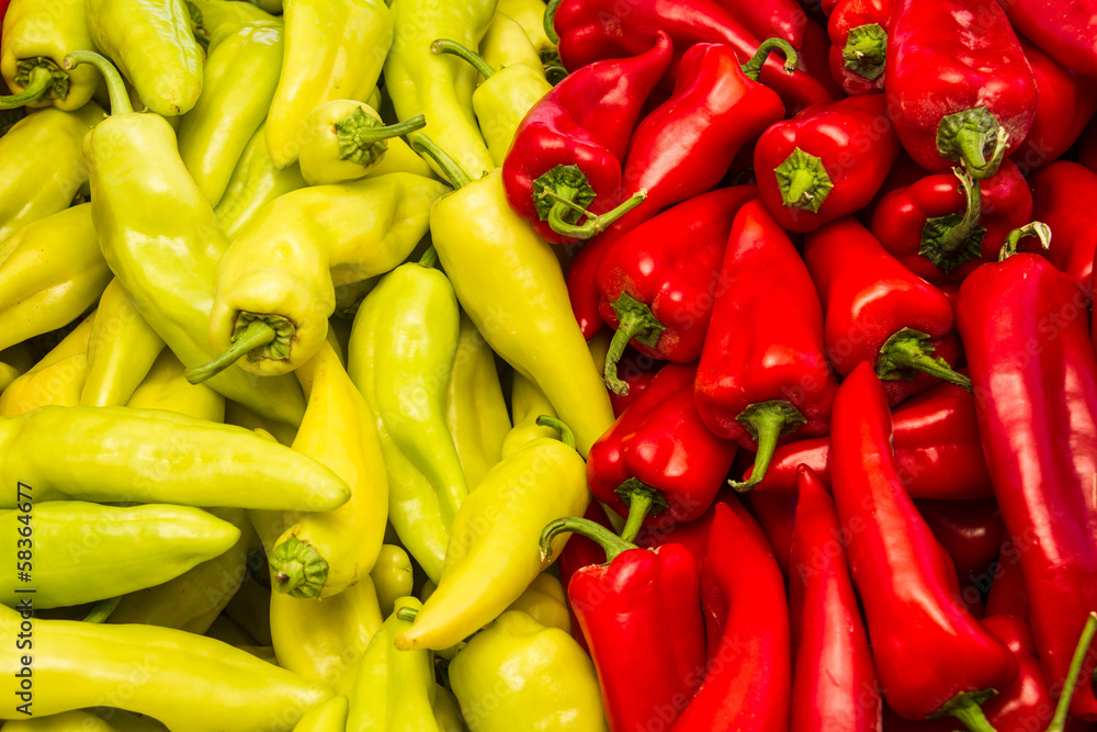 Fresh harvest of green and red peppers in local fruit market Fresh harvest of green and red peppers in local fruit market