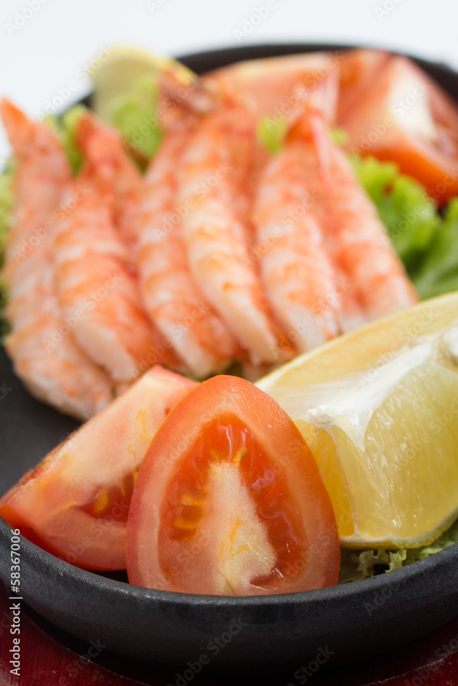 fried shrimp with vegetables on plate isolated fried shrimp with vegetables on plate isolated