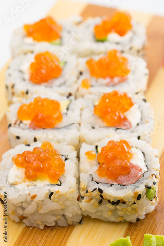 sushi roll with sesame and caviar