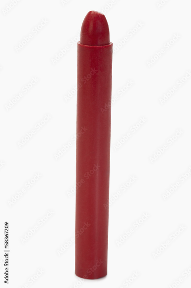 Close-up of a red crayon