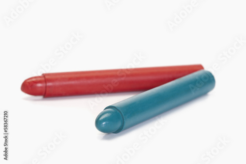 Close-up of red and blue crayons