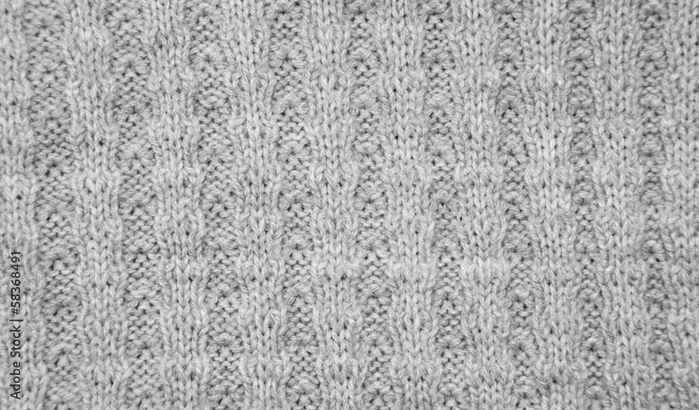 background of gray knitted fabrics. texture background of gray knitted fabrics. texture