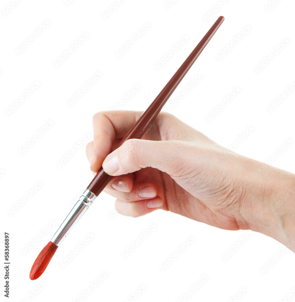 Hand holding brush with red paint isolated on white Hand holding brush with red paint isolated on white