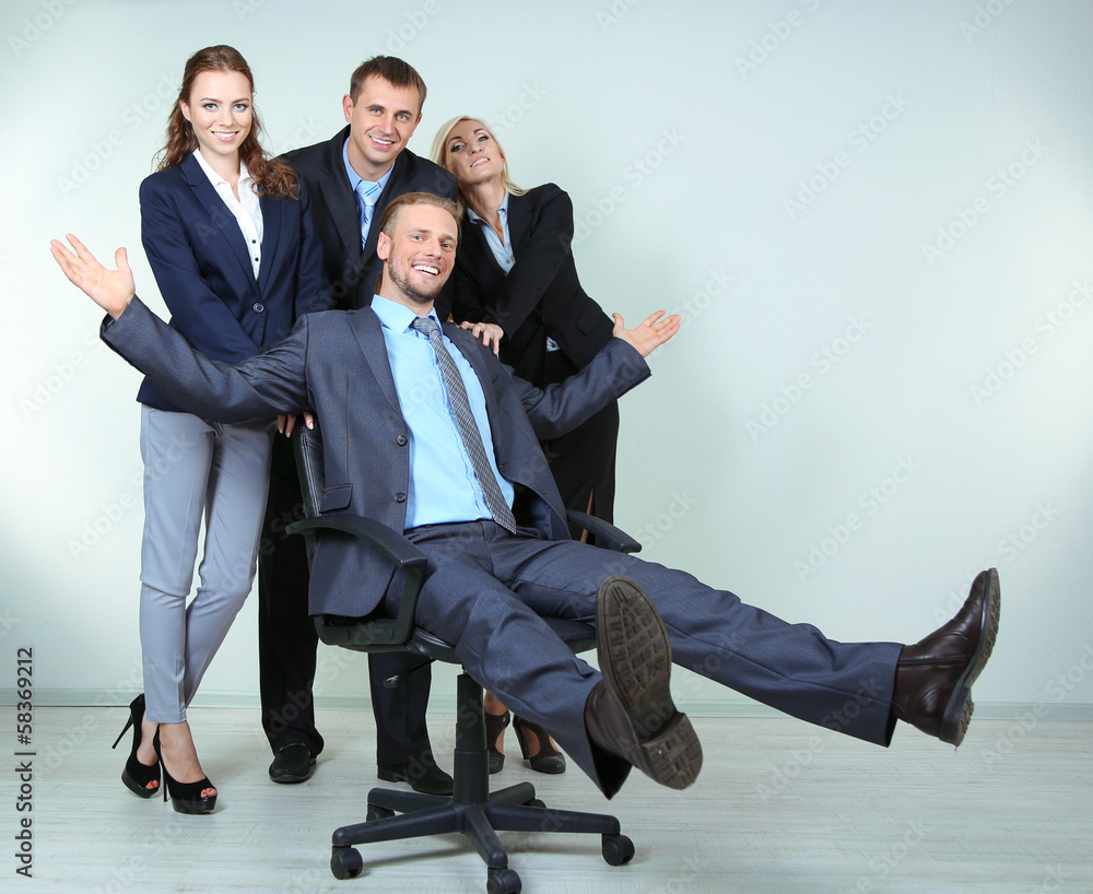 Group of business people on gray background