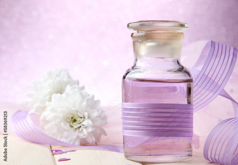 Glass bottles with color essence, on light background Glass bottles with color essence, on light background