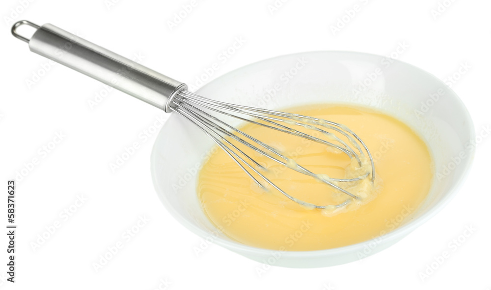 Corolla and broken eggs with flour isolated on white Corolla and broken eggs with flour isolated on white