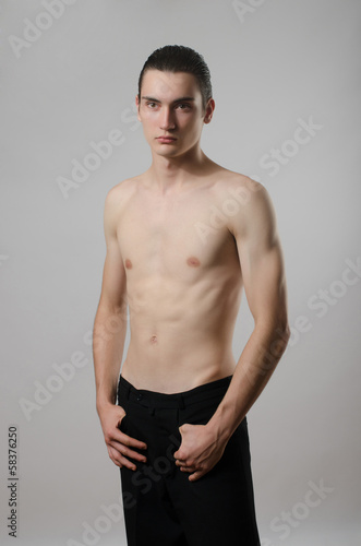 Very skinny young man, slim beautiful boy, anorexic body