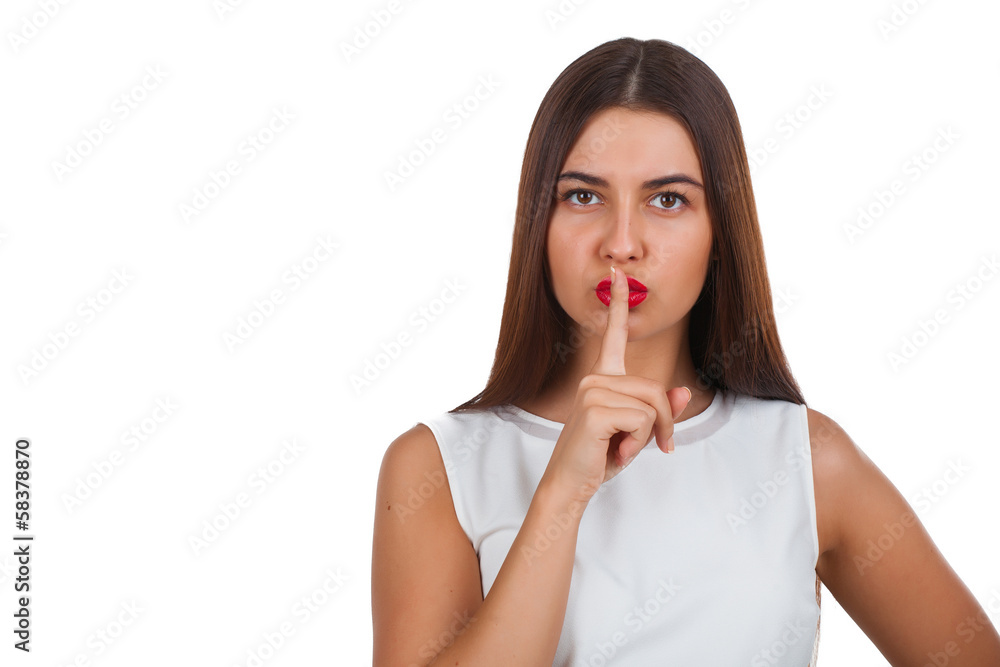 Portrait of beautiful woman making a hush gesture Portrait of beautiful woman making a hush gesture