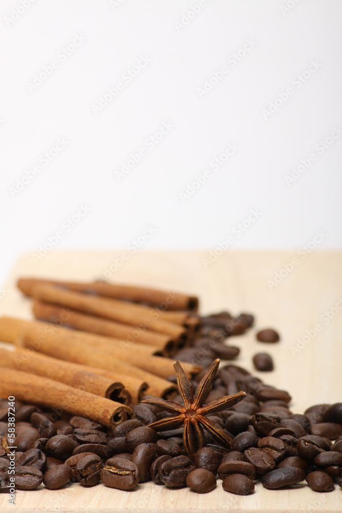 Fototapeta coffee beans on wooden surface