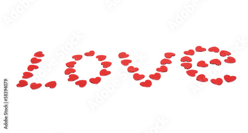 Word Love collected from small red hearts isolated
