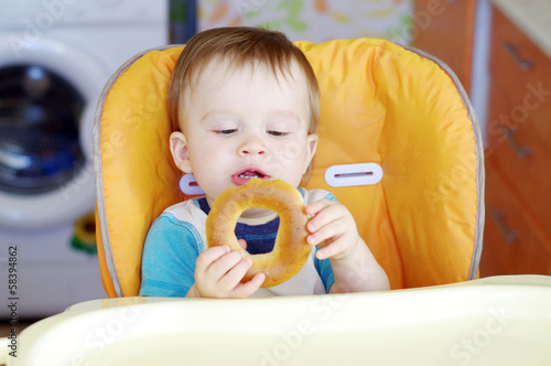 baby boy with round cracknel photo