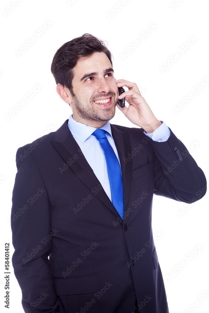 Handsome business man talking on the phone, isolated on a white Handsome business man talking on the phone, isolated on a white