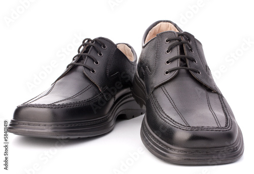 Black glossy man’s shoes with shoelaces © Natika