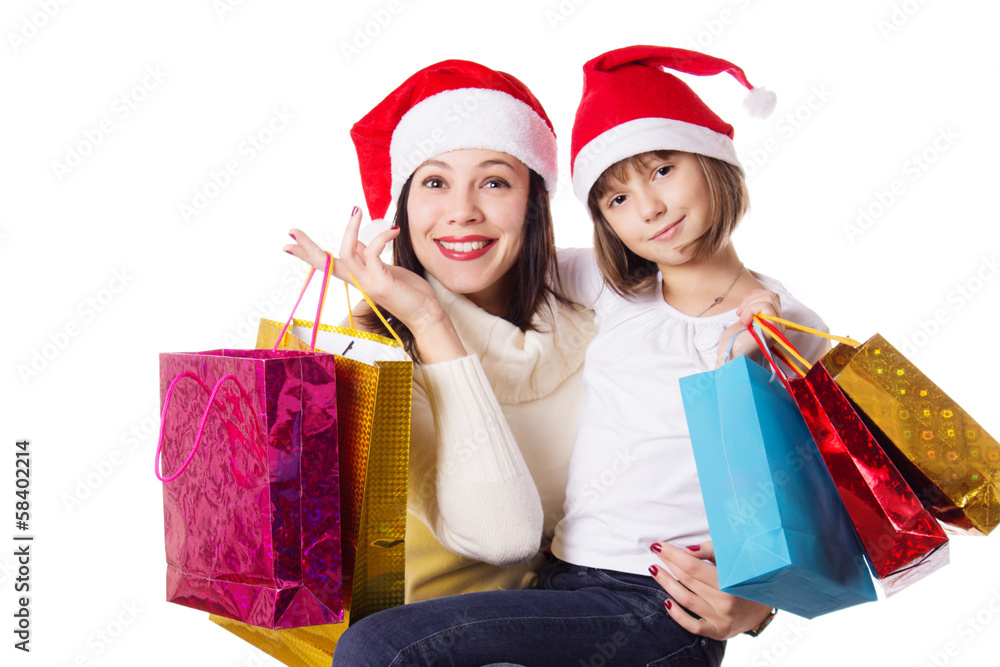 Happy mother and daughter on Christmas shopping