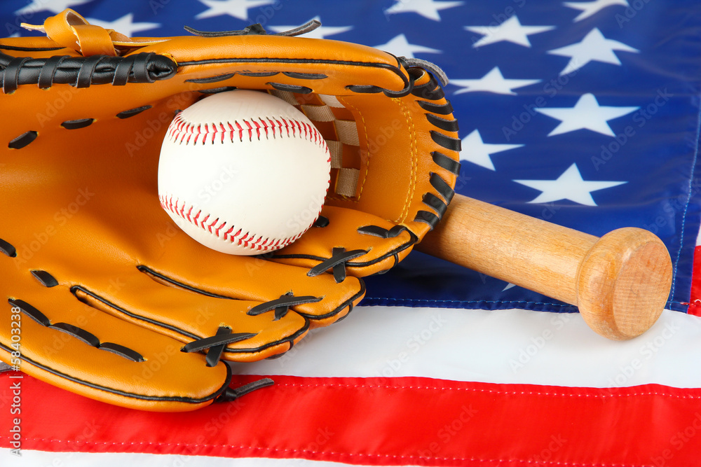 Baseball glove, bat and ball on American flag background