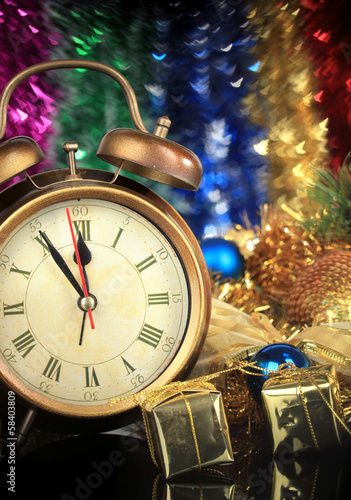 Composition of clock and christmas decorations