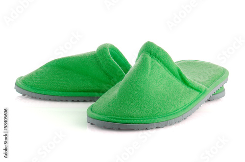 A pair of green slippers