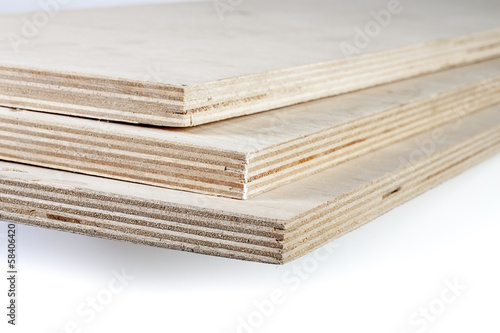 three light plywood boards stacked