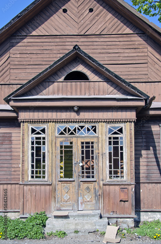 old derelict wooden house facade