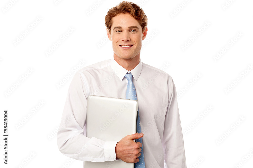 Confident corporate man holding laptop Confident corporate man holding laptop