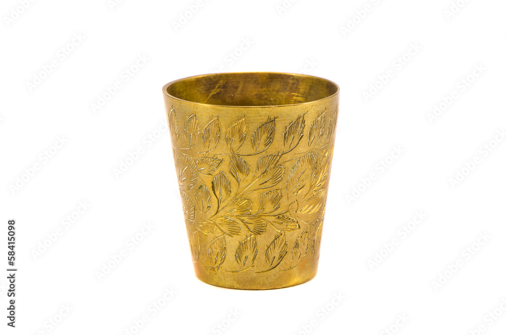 ancient engrave brass cup isolated on white ancient engrave brass cup isolated on white