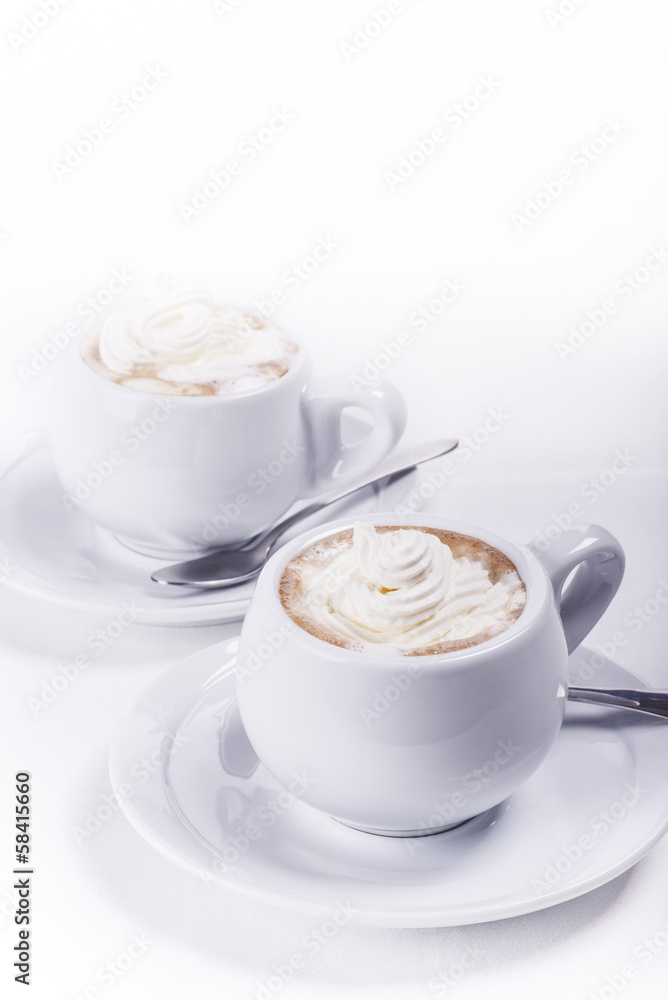 Coffee and whipped cream on white background Coffee and whipped cream on white background