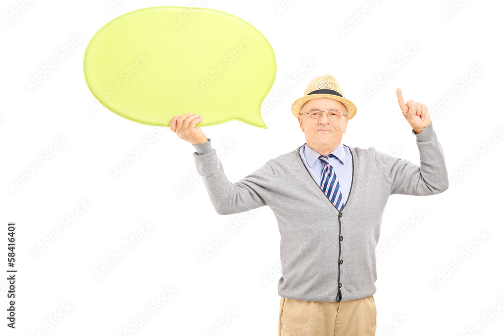Senior gentleman holding a speech bubble and gesturing Senior gentleman holding a speech bubble and gesturing