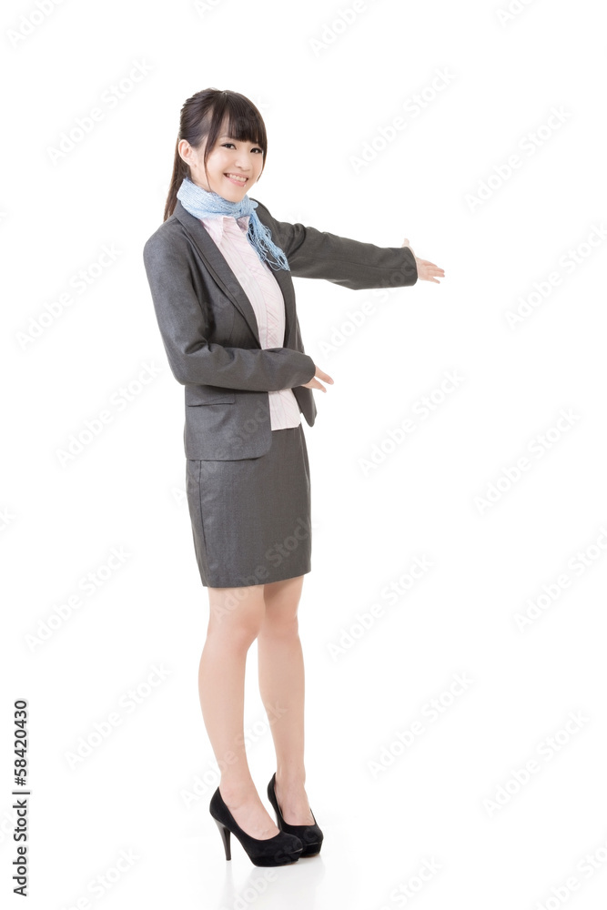 Attractive business woman showing or introducing Attractive business woman showing or introducing