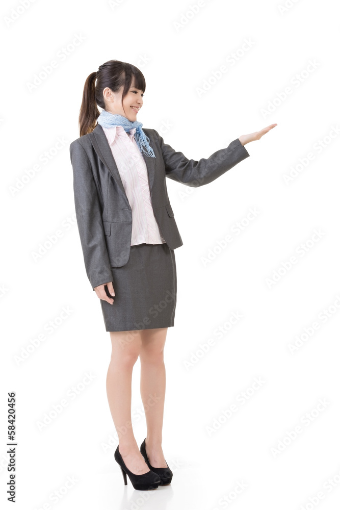Attractive business woman showing or introducing Attractive business woman showing or introducing
