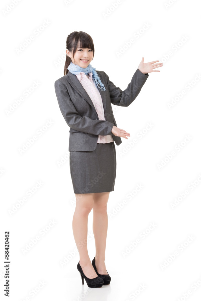 Attractive business woman showing or introducing Attractive business woman showing or introducing
